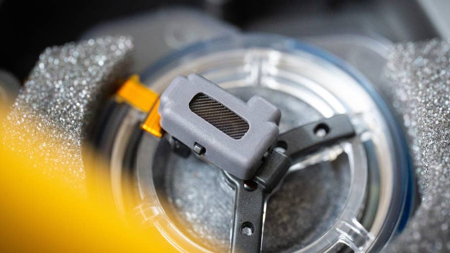 Close-up of part of the Sony WH-1000XM6 headphones, showing its intricate design.