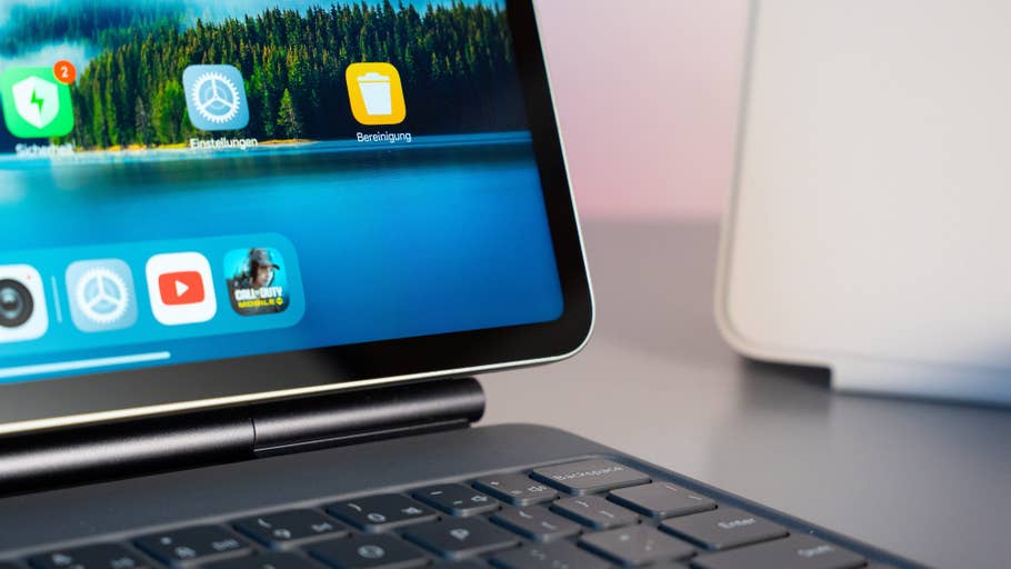 Close up of Xiaomi Pad 7 screen with various app icons and a keyboard.