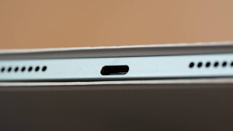 Close-up of the Xiaomi Pad 7 with a USB-C port and speaker holes.