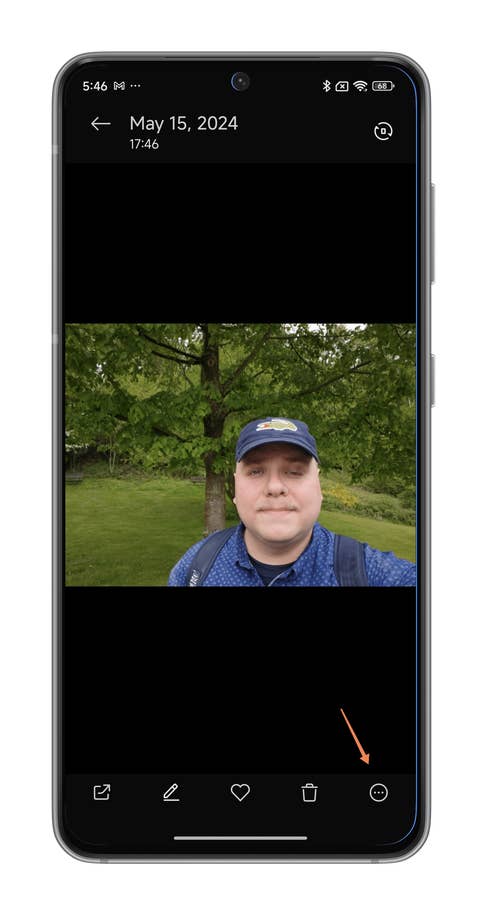 HyperOS screenshots on adding a watermark to your photos in your Xiaomi smartphone.
