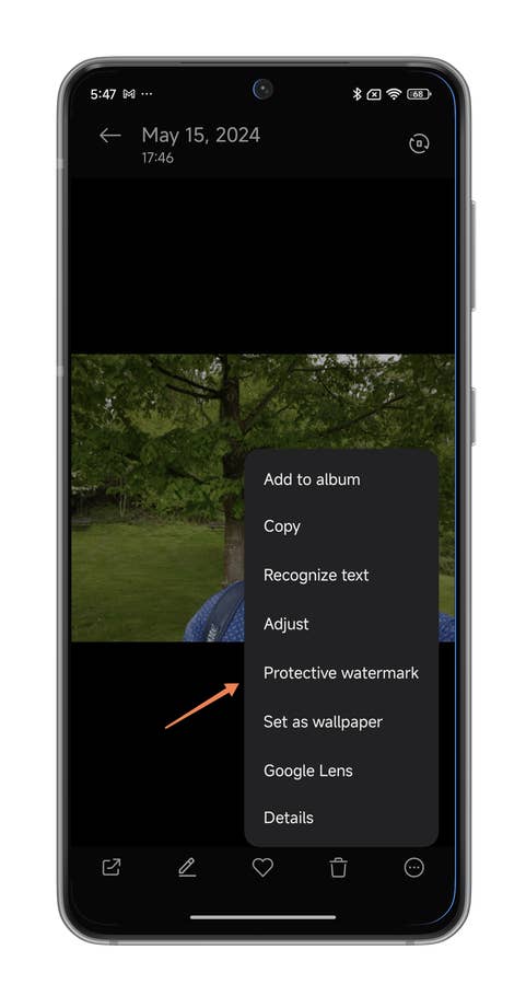 HyperOS screenshots on adding a watermark to your photos in your Xiaomi smartphone.