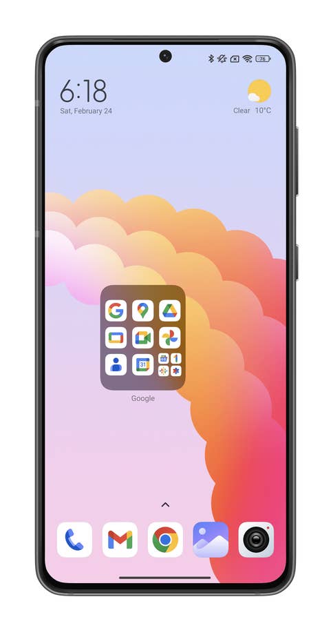 Screenshot depicting the creation of an XXL apps folder on the Xiaomi 14u0027s HyperOS home screen.
