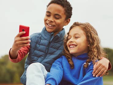 Two children use the XploraOne.